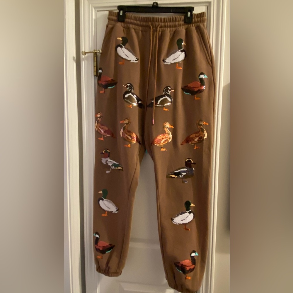 QUEEN OF SPARKLES Brown Duck Print Track Joggers